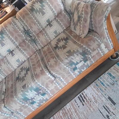 The Loren Mitchell Collection Southwestern style sofa with wood trim front (2)