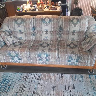 The Loren Mitchell Collection Southwestern style sofa with wood trim front (2)