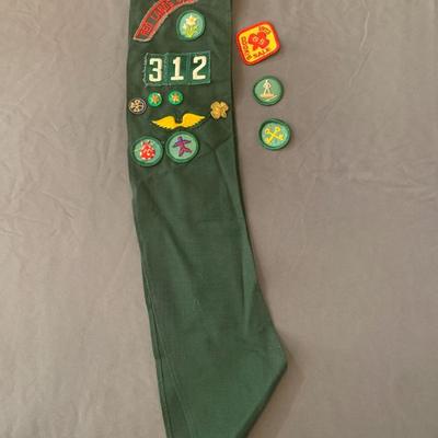 Vintage Girl Scout sash with badges and pins