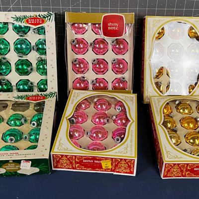 6 Boxes of Shinny Ornaments; Pink Green and Gold