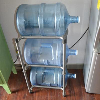 LOT 3.  FIVE GALLON WATER BOTTLES AND STORAGE RACK