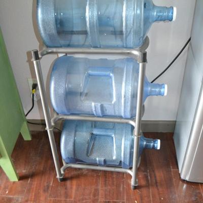 LOT 3.  FIVE GALLON WATER BOTTLES AND STORAGE RACK