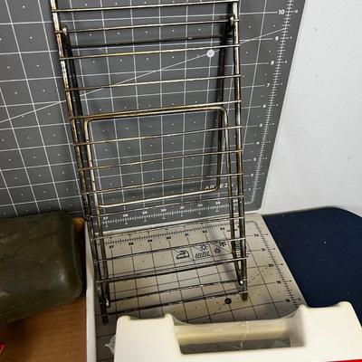 Tray of Survival Emergency Stuff: Matches, Compass, Mess Kit First Aid Kit.