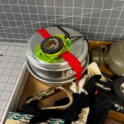 Tray of Survival Emergency Stuff: Matches, Compass, Mess Kit First Aid Kit.