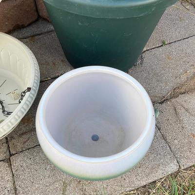 POTS or PLANTERS Whichever you would like them to be and a Flower