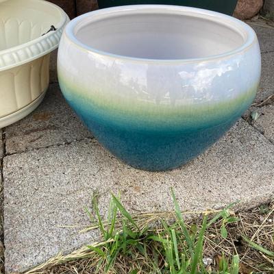 POTS or PLANTERS Whichever you would like them to be and a Flower