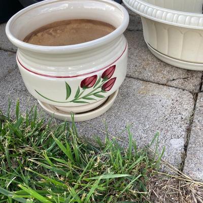 POTS or PLANTERS Whichever you would like them to be and a Flower