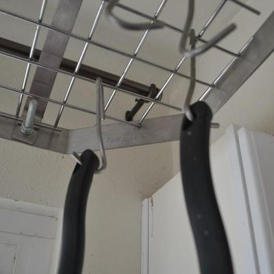 LOT 32. T-FAL PAN SET AND PAN RACK