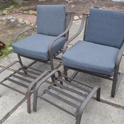 LOT 64 TWO PATIO CHAIRS WITH OTTOMANS