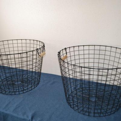 LOT 67. TWO METAL BASKETS