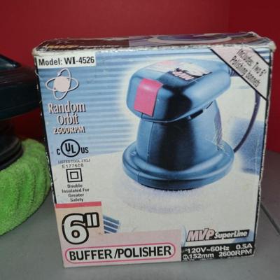 LOT 101. TWO CAR POLISHERS