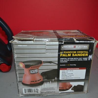 LOT 102. PORTABLE HEATER AND PALM SANDER