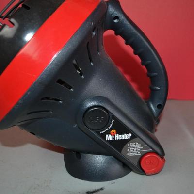 LOT 102. PORTABLE HEATER AND PALM SANDER