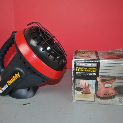 LOT 102. PORTABLE HEATER AND PALM SANDER