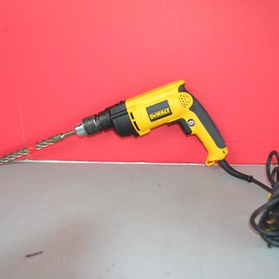 LOT 112. DEWALT DW511 HAMMER DRILL