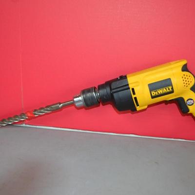 LOT 112. DEWALT DW511 HAMMER DRILL