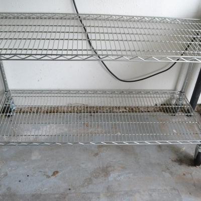 LOT 130 WIRE RACK ON WHEELS 48" X 76"