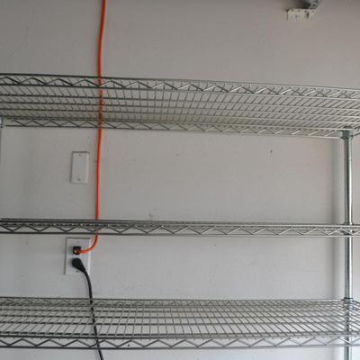 LOT 130 WIRE RACK ON WHEELS 48" X 76"