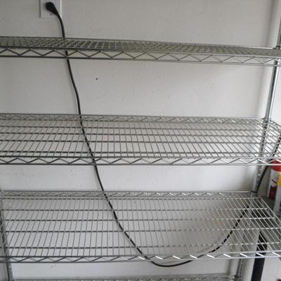 LOT 130 WIRE RACK ON WHEELS 48" X 76"