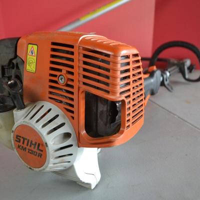 LOT 132. STIHL KOMBI MOTOR  MULTI SYSTEM POWER HEAD AND WEED CUTTER ATTACHMENT