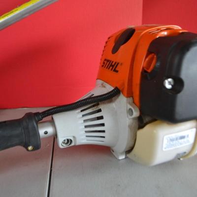 LOT 132. STIHL KOMBI MOTOR  MULTI SYSTEM POWER HEAD AND WEED CUTTER ATTACHMENT