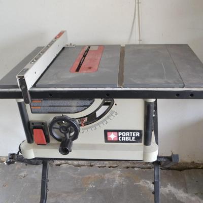 LOT 146. PORTER CABLE PORTABLE TABLE SAW AND STAND