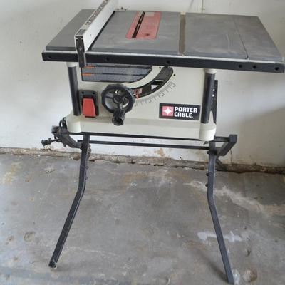 LOT 146. PORTER CABLE PORTABLE TABLE SAW AND STAND