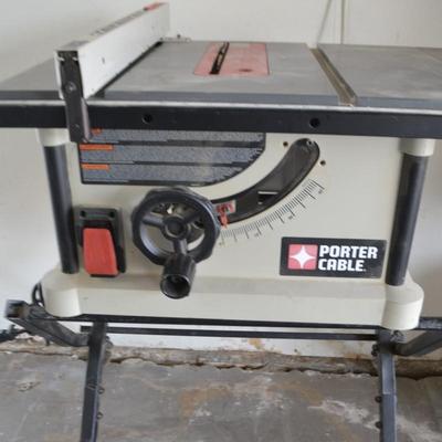 LOT 146. PORTER CABLE PORTABLE TABLE SAW AND STAND