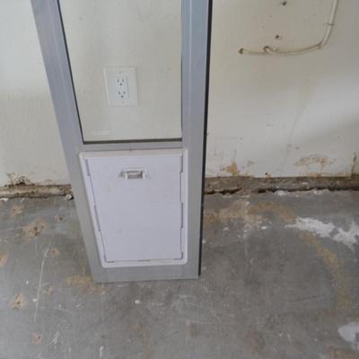 LOT 153. SLIDING DOOR DOGGIE DOOR