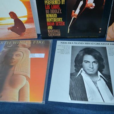 LOT 165.  COLLECTION OF 7 ALBUMS