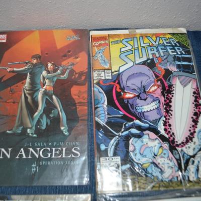 LOT 174. COLLECTION OF EIGHT COMIC BOOKS