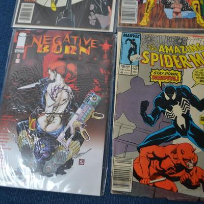 LOT 184. COLLECTION OF EIGHT COMIC BOOKS