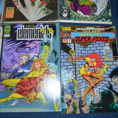 LOT 184. COLLECTION OF EIGHT COMIC BOOKS