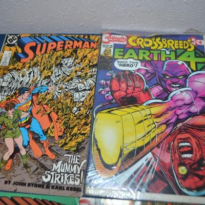 LOT 186. COLLECTION OF EIGHT COMIC BOOKS
