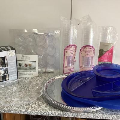 Entertaining Lot- plastic ware and 5 light metal trays