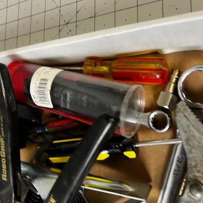 More Garage Items: Tools, Oil Can, Screwdriver and Tape Measure