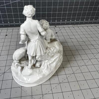 White Porcelain Figurine Marked N with a Crown