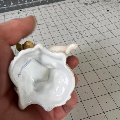 Small German Porcelain Cherub with Flower Basket 