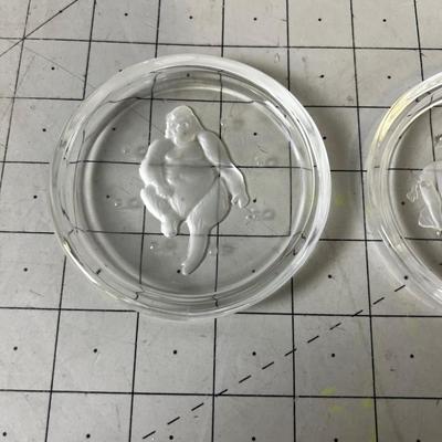 2 Coasters. Clear. Gorilla and Rhino. 