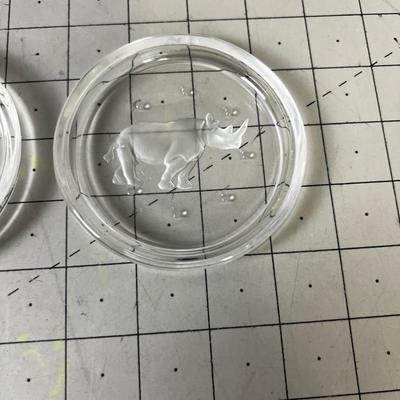 2 Coasters. Clear. Gorilla and Rhino. 