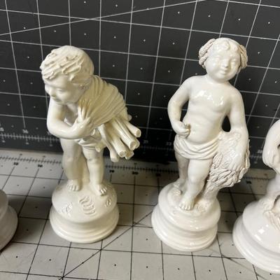 WHITE  (4) Italian Porcelain Cherub Statues 