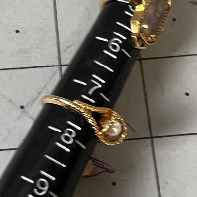 2 Gold Toned Rings 