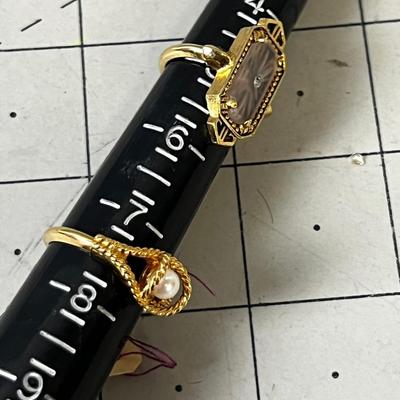 2 Gold Toned Rings 