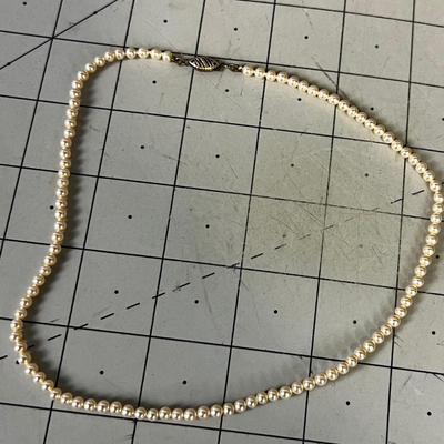 Vintage Strand of small pearls. NEAT Clasp. 