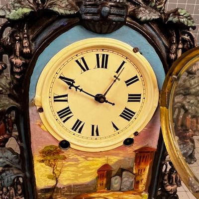 ANTIQUE, CAST FRONT CLOCK. 