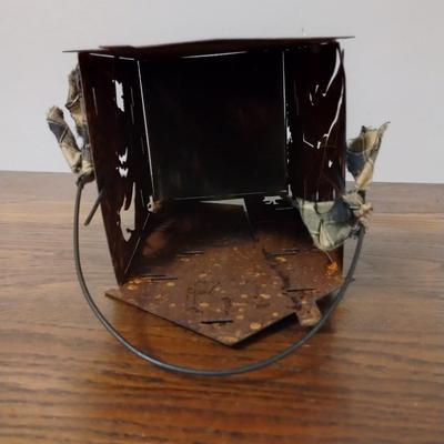Tin candle holder house