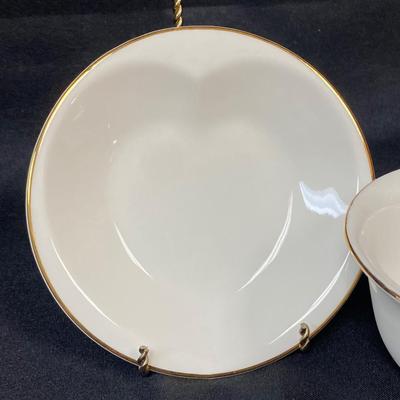 White with Gold Rim Heart Shaped Indent Teacup and Saucer