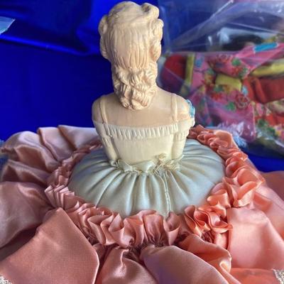 ANTIQUE PIN CUSION AND SOME OLE HEADLESS DOLLâ€™S IN NEED OF NEW RUBBER BANDS