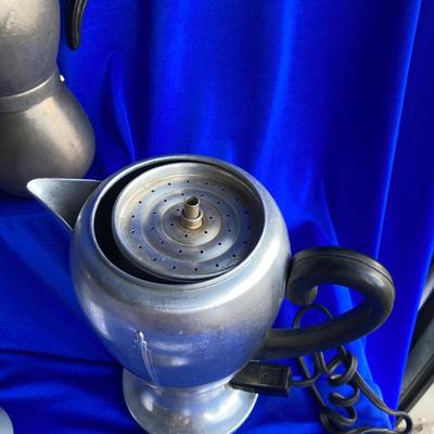 A VARIETY OF VINTAGE COFFEE POTS AND A COFFEE GRINDER TO TRY THEM OUT WITH