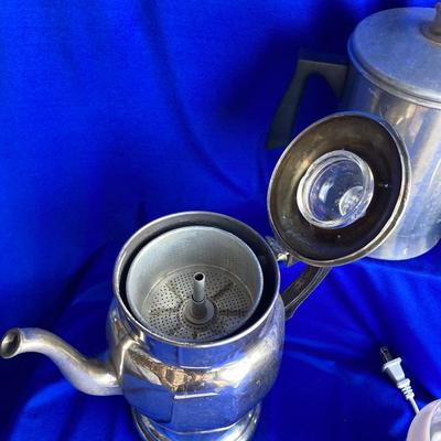 A VARIETY OF VINTAGE COFFEE POTS AND A COFFEE GRINDER TO TRY THEM OUT WITH